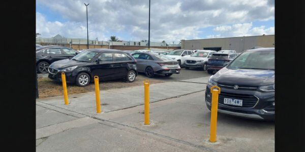 Removable bollards Mornington installation at car dealership